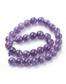 Amatista. 04 mm diámetro. 0,6 mm perforación. 85 unidades hilo (aproximado)