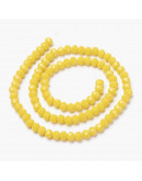 Rondelle faceteado. 6x4 milímetros. Amarillo. 1 mm perforación. 90 uds hilo (aproximado).