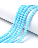 Rondelle faceteado. 6x4 milímetros. Celeste. 1 mm perforación. 90 uds hilo (aproximado).