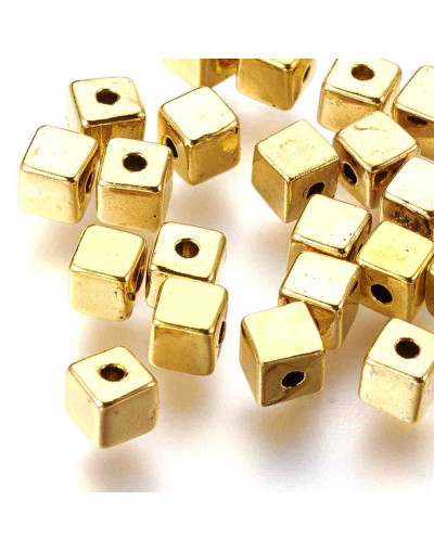 Cubos (1). Aleación de cobre. Color dorado. 3 milímetros. 1 mm perforación. 40 unidades.