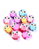 Buhos. Varios colores. 10x11x4 milímetros. 1,5 mm de perforación. 10 unidades.