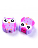 Buhos. Varios colores. 10x11x4 milímetros. 1,5 mm de perforación. 10 unidades.