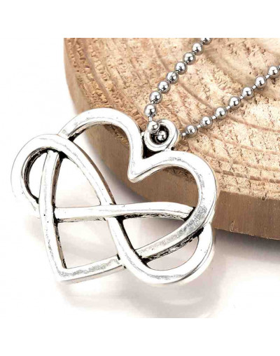 Infinito+Corazón. Aleación de cobre. Color plata antigua. 22x27x2 mm. 1,5 mm perforación. 5 uds.