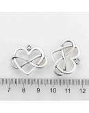 Infinito+Corazón. Aleación de cobre. Color plata antigua. 22x27x2 mm. 1,5 mm perforación. 5 uds.
