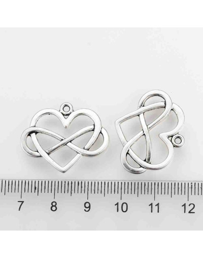 Infinito+Corazón. Aleación de cobre. Color plata antigua. 22x27x2 mm. 1,5 mm perforación. 5 uds.