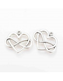 Infinito+Corazón. Aleación de cobre. Color plata antigua. 22x27x2 mm. 1,5 mm perforación. 5 uds.