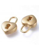 Corazón-Candado. Acero inoxidable. Color dorado. 19,5x13x5 mm. 4,5x7 mm aguejero. 1 unidad. Corazón-Candado. Acero inoxidable. Color dorado. 19,5x13x5 mm. 4,5x7 mm aguejero. 1 unidad.