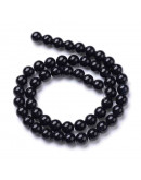 Jade. Negro. 04 milímetros diámetro. 0,8 mm perforación. 96 unidades hilo (aproximado). Jade. Negro. 04 milímetros diámetro. 0,8 mm perforación. 96 unidades hilo (aproximado).