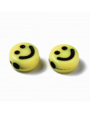 Smile negro. Moneda amarilla. 7x3,5 milímetros. 1,5 mm perforación. 100 unidades aproximado.