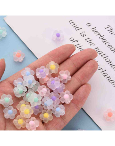 Flor (4). Varios colores. Transparente. 12x12x6 milímetros. 2,5 mm perforación. 20 unidades.