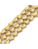 Hematite sintético. Corazón dorado. 6x5,5x3 milímetros. 1 mm perforación. 10 uds Hematite sintético. Corazón dorado. 6x5,5x3 milímetros. 1 mm perforación. 10 uds