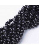 Esfera faceteada. 06 milímetros diámetro. Negro. 1 mm perforación. 50 unidades hilo (aproximado).