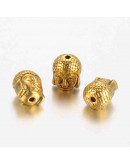 Buddha. Aleación de cobre. Color oro antiguo. 11x9x8 milímetros. 1,5 mm de perforación. 4 unidades