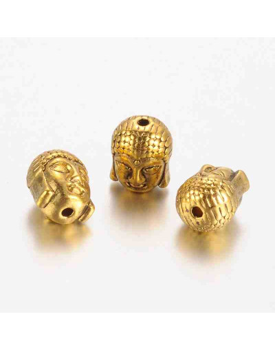 Buddha. Aleación de cobre. Color oro antiguo. 11x9x8 milímetros. 1,5 mm de perforación. 4 unidades