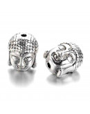 Buddha. Aleación de cobre. Color plata antigua. 11x9x8 milímetros. 1,5 mm de perforación. 4 unidades