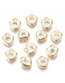 Corazón. Aleacion+Zirconia. Baño 18K Gold. 7x6x2 milímetros. 1,2 mm perforación. 4 unidades. Corazón. Aleacion+Zirconia. Baño 18K Gold. 7x6x2 milímetros. 1,2 mm perforación. 4 unidades.