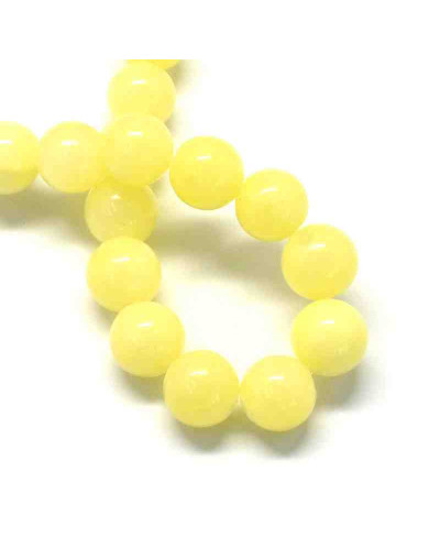 Jade. Amarillo (1). 04 milímetros diámetro. 0,50 mm perforación. 95 unidades hilo (aproximado)