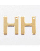 Letra "H". Acero inoxidable. Color dorado. 11x0,8 milímetros. 1 mm perforación. 1 unidad. Letra "H". Acero inoxidable. Color dorado. 11x0,8 milímetros. 1 mm perforación. 1 unidad.