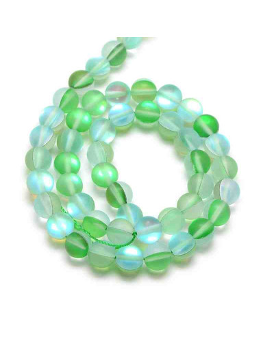 Piedra luna sintética. Colores varios sin pulir. 6 milímetros diámetro. 1 mm perforación. 20 uds.