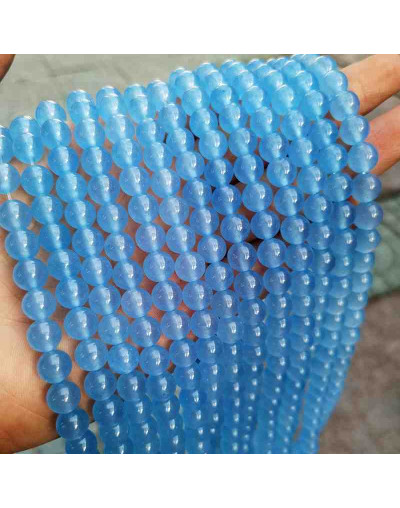 Calcedonia. Light Blue. 08 milímetros diámetro. 1 mm perforación. 45 unidades hilo (aproximado).