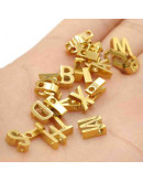 Letra "S" Acero inoxidable Color dorado 8x2.5 milímetros 2 mm perforación 1 unidad