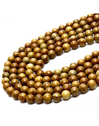 Madera fósil. 04 milímetros diámetro. 0,80 mm perforación. 90 unidades hilo (aproximado)