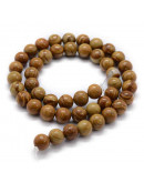 Madera fósil. 10 milímetros diámetro. 1 mm perforación. 35 unidades hilo (aproximado)