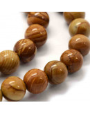 Madera fósil. 10 milímetros diámetro. 1 mm perforación. 35 unidades hilo (aproximado)