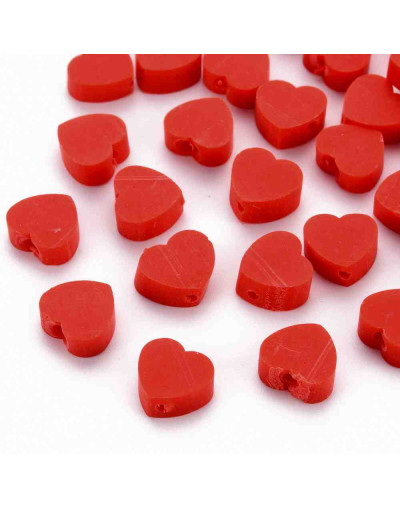Corazón. Color rojo. 8x9x5 milímetros. 1,2 mm perforación. 10 unidades.