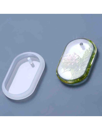 Molde de silicona. Para resina. Ovalo. 52x35x7,5 milímetros. 3 mm perforación. 1 unidad.