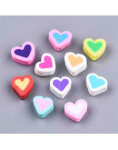 Corazón. Varios colores. 9x9x5 milímetros. 2 milímetros perforación. 10 unidades.