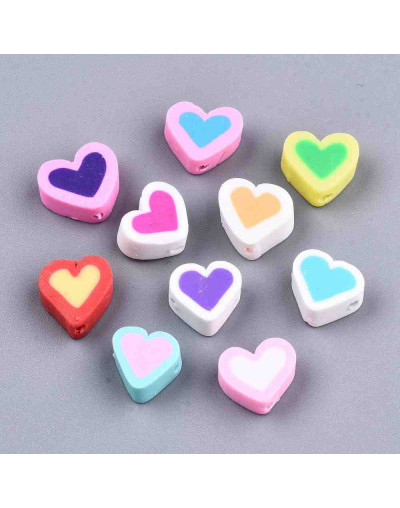 Corazón. Varios colores. 9x9x5 milímetros. 2 milímetros perforación. 10 unidades.