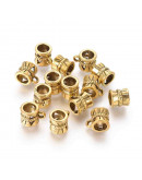 Bail Beads (2). Aleación. Dorado antiguo. 9 mm largo. 7 mm perforación. 2 mm arandela. 20 uds.