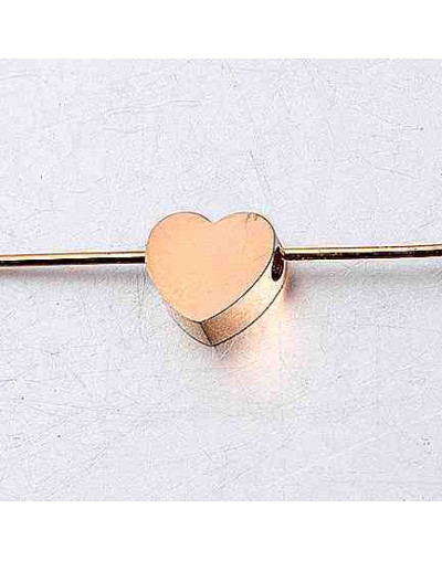 Corazón. Acero inoxidable. Color gold rose. 8 milímetros. 2 mm perforación. 1 unidad