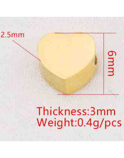 Corazón. Acero inoxidable.Color dorado.6 milímetros 2 mm perforación. 1 unidad