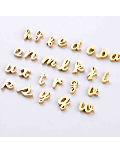 Letra "b" minúscula Acero inoxidable. Color dorado. 10x3 milímetros 2 mm perforación. 1 unidad