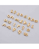 Letra "u" minúscula Acero inoxidable. Color dorado. 10x3 milímetros 2 mm perforación. 1 unidad