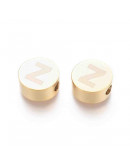 Moneda con letra Z. Acero inoxidable. Color dorado. 10 mm diámetro. 4,5 mm grosor. 2 mm perforación.