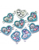 Corazón+flores. Aleación de cobre y esmalte. 15,5x23x2 milímetros. 1,8 mm perforación. 2 unidades.