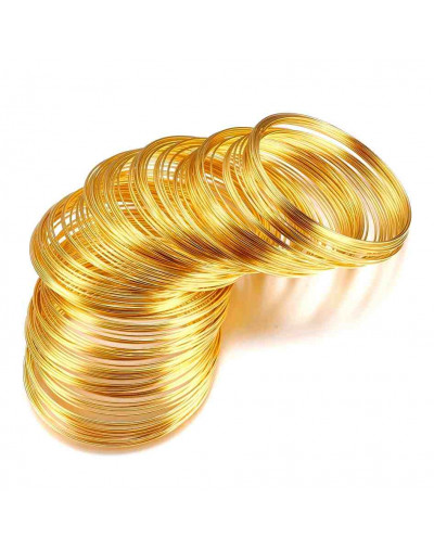 Acero memoria. Color dorado. Calibre 20 (0,80 mm). 6 centímetros diámetro. 10 vueltas.