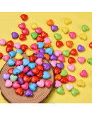 Corazón (2). Varios colores. 10x11x6 milímetros. 2 mm perforación. 50 unidades.