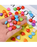 Corazón (2). Varios colores. 10x11x6 milímetros. 2 mm perforación. 50 unidades.
