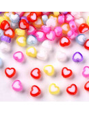 Corazón (5). Varios colores. 7x8x4 milímetros. 2 mm perforación. 50 unidades.