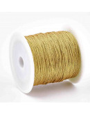 Cordón de nylon. 1 milímetro grosor. Color GOLD METALLIC. 100 metros. 1 cono. Cordón de nylon. 1 milímetro grosor. Color GOLD METALLIC. 100 metros. 1 cono.