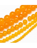 Jade Malaysia. Color amarillo. 04 mm diámetro. 0,8 mm perforación. 90 unidades hilo (aproximado).