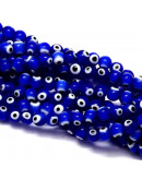Ojo turco. Esfera. Color azul. 6 milímetros diámetro. 1 mm perforación. 65 uds hilo (aprox.) Ojo turco. Esfera. Color azul. 6 milímetros diámetro. 1 mm perforación. 65 uds hilo (aprox.)