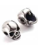 Calavera (1). Acero inoxidable. Color plata antigua. 10,5x8x10 milímetros. 2,3 mm perforación. 1 ud.