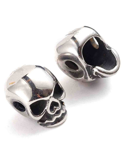 Calavera (1). Acero inoxidable. Color plata antigua. 10,5x8x10 milímetros. 2,3 mm perforación. 1 ud.