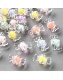 Caramelo (1). Varios colores. 9x17x8,5 milímetros. 2 mm perforación. 20 unidades.