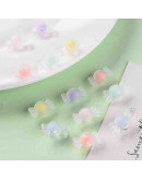 Caramelo (2). Varios colores frost. 9x17x8,5 milímetros. 2 mm perforación. 20 unidades.